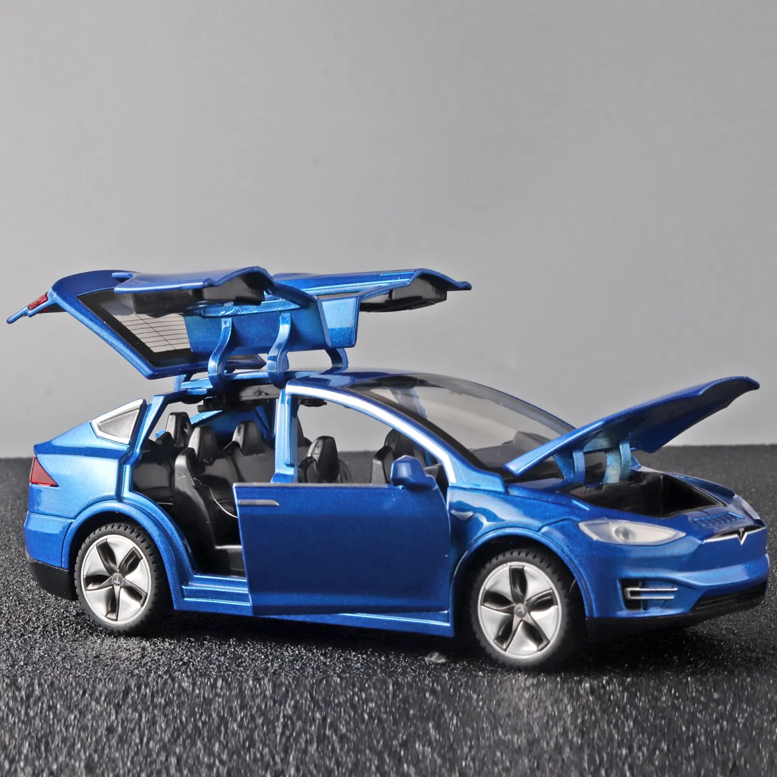 Model X Toy Car, 1:32 giocattoli per auto pressofusi in lega di zinco per bambini, tirare indietro il modello di auto in scala di apertura della