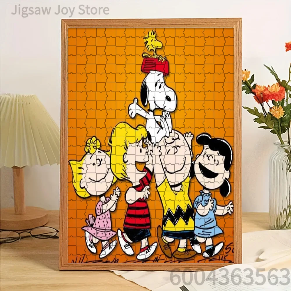 

Paper Jigsaw Puzzle Peanuts Gang Lifting Snoopy & Woodstock Orange Background Artwork Brain Teaser