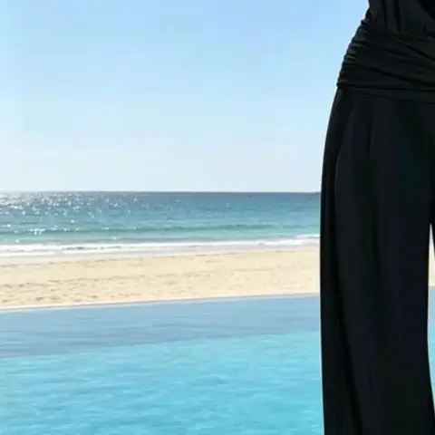 

2026 Deep V Neck Women's Jumpsuits Elegant Solid High Waist Rompers Casual Wide Leg Pants Pocket Overalls Vacation Outfit Loose