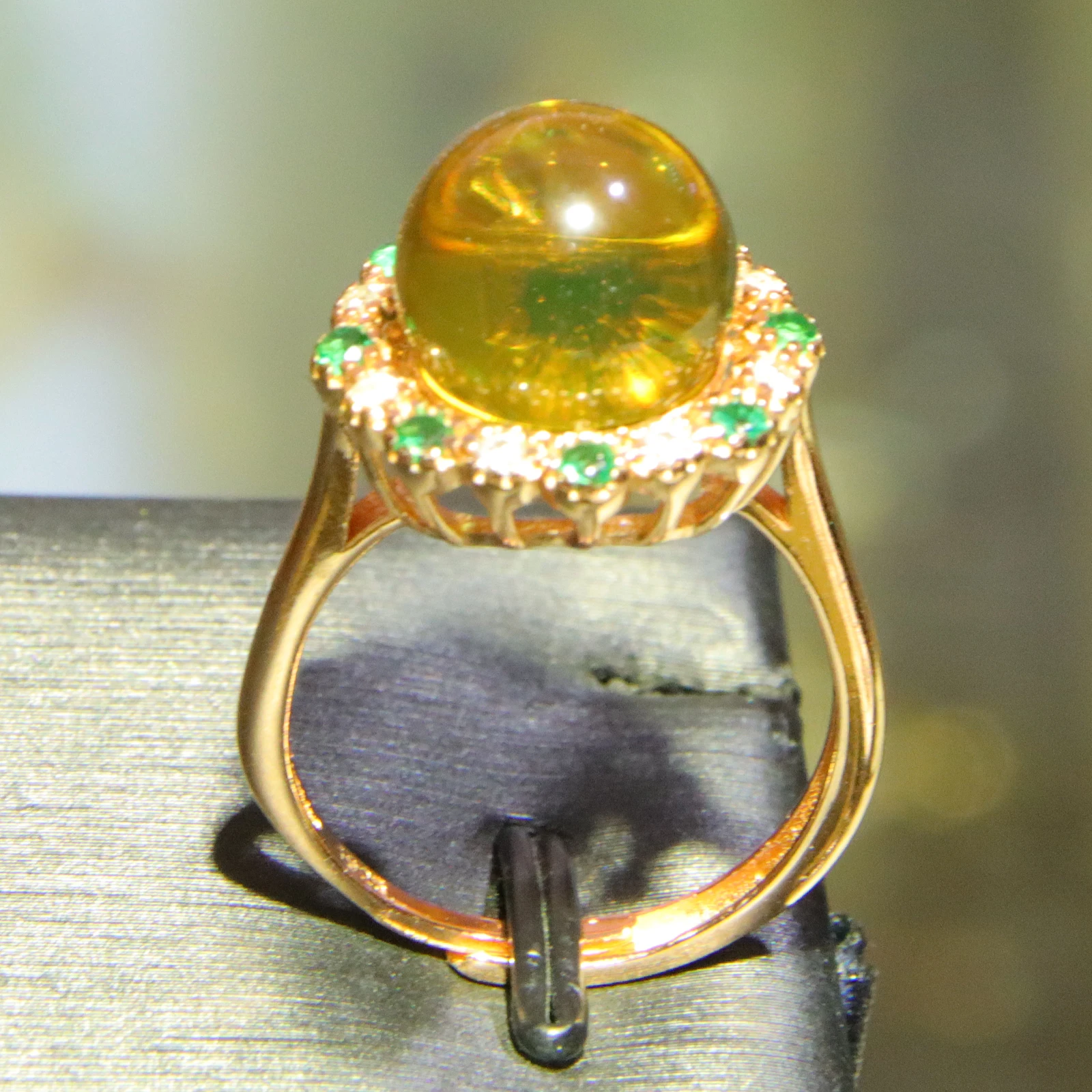 

Romantic Gift for Her: 11mm Blue Amber Ring with Green Gemstones & Diamonds | Adjustable Rose Gold Plated Silver Ring