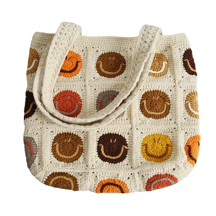 

Hand crocheted smiley face shoulder bag, snow wool woven women's bag, small fresh smile pattern shoulder bag
