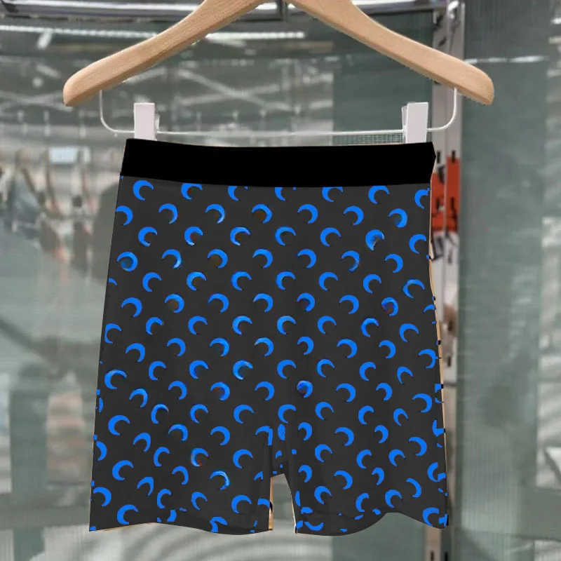 [black and blue moon shorts] black pants