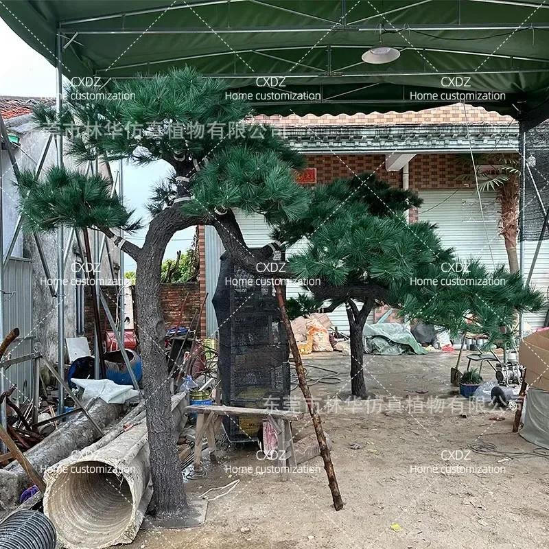 Simulation pine welcome pine fake tree landscape hotel decoration Luo Hansong landscaping floor staircase exhibition hall