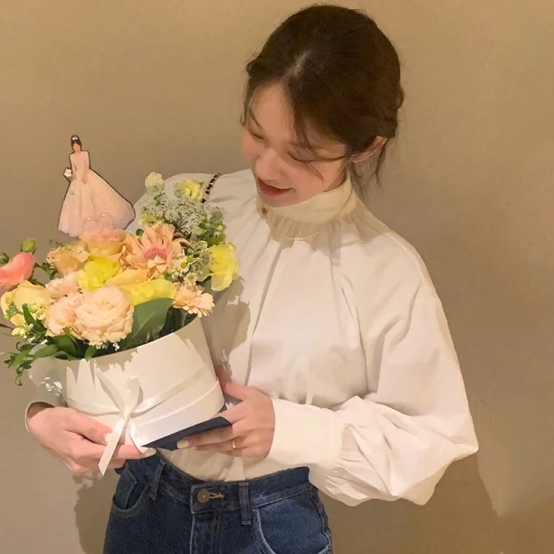 세련된 미니멀리스트 여성 셔츠 랜턴 슬리브 루즈핏 스탠드 칼라 싱글 버튼 디자인 한국 스타일 긴 소매 탑