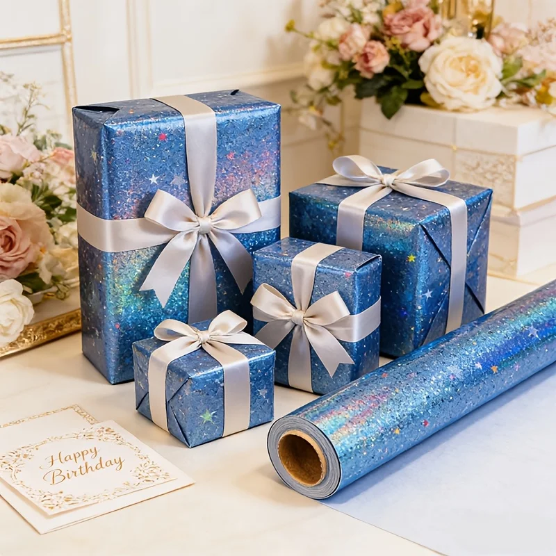 Rollo de Papel de Regalo con Diseño de Estrellas en Degradado Azul, 43.18x299.72 cm por Rollo, con un Diseño de Estrellas Metálicas Holográficas. Papel para Manualidades