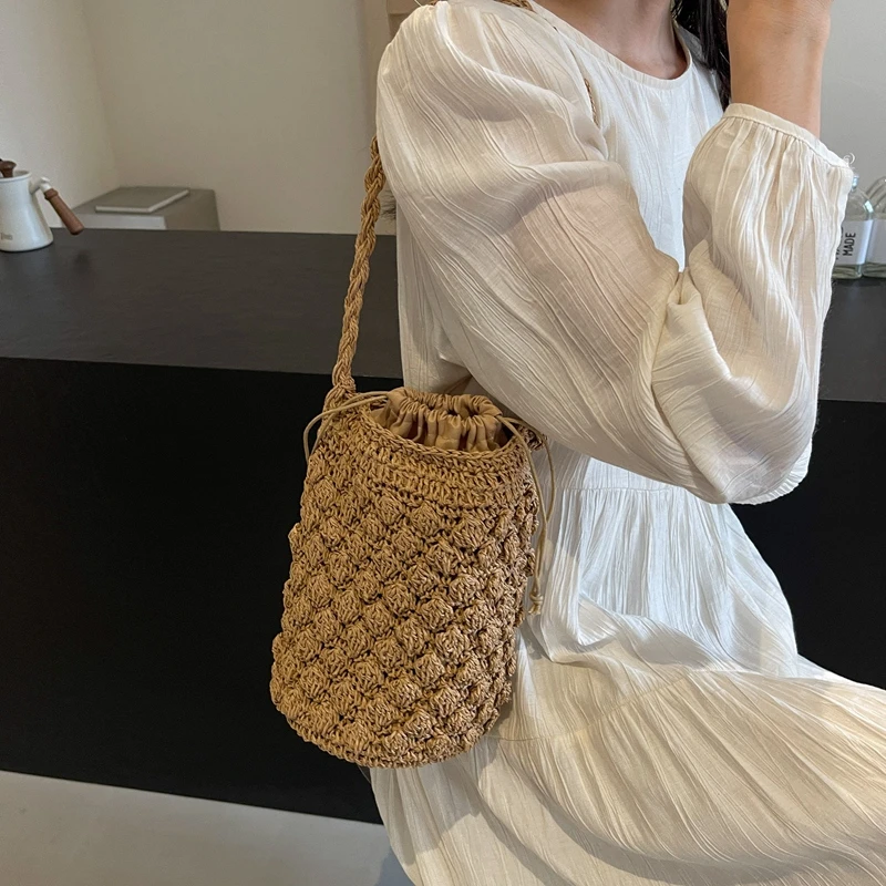 Bolso de hombro Retro con cordón para mujer, bolsa de cubo, bolso de mano bohemio, paquete axilar, bolso tejido de paja, bolsos de moda, Verano