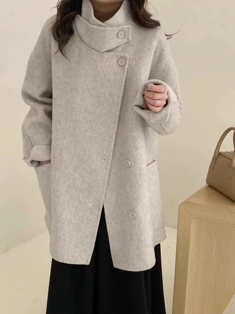 2024 cappotto in cashmere a doppia faccia da donna collo alto medio e lungo cappotto di lana piccolo stile Hepburn sciolto