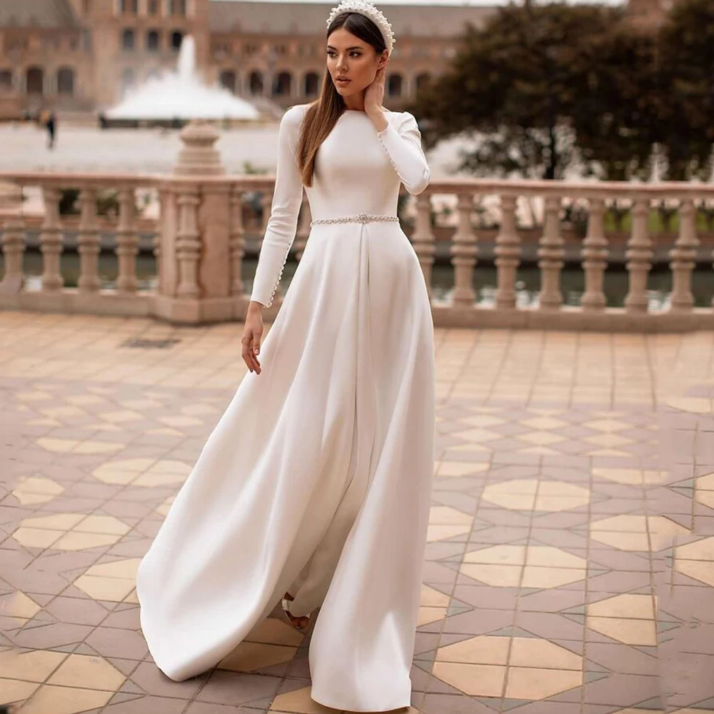 

Simple Long Sleeves Wedding Dresses with Buttons and Beading Belt Illusion Back Sweep Train Bridal Customized Floor Length Gowns