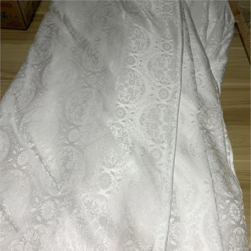 This is a new Chinese-style fabric made of white silk and with base