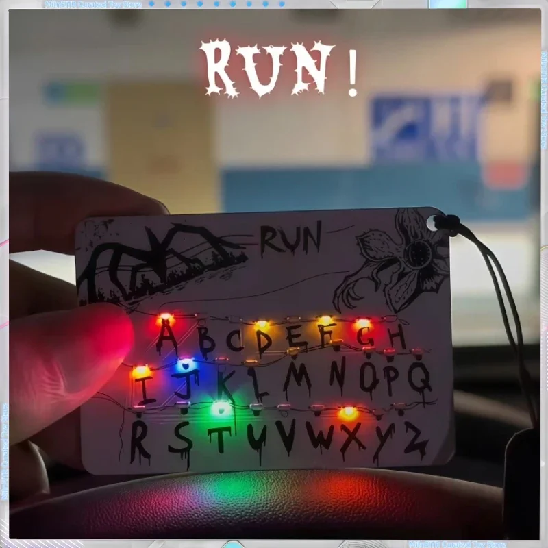 Stranger Things Season 5 Merch Light Pendant - 26 Letters3 Music4 Lights,Rechargeable - Car Pendant Festival Gift with Light Bag