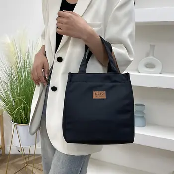 大容量午餐包,鋁箔隔熱,適合工作場合,簡約實用,頂部提把設計。 8 最佳銷售 便當袋 - №8