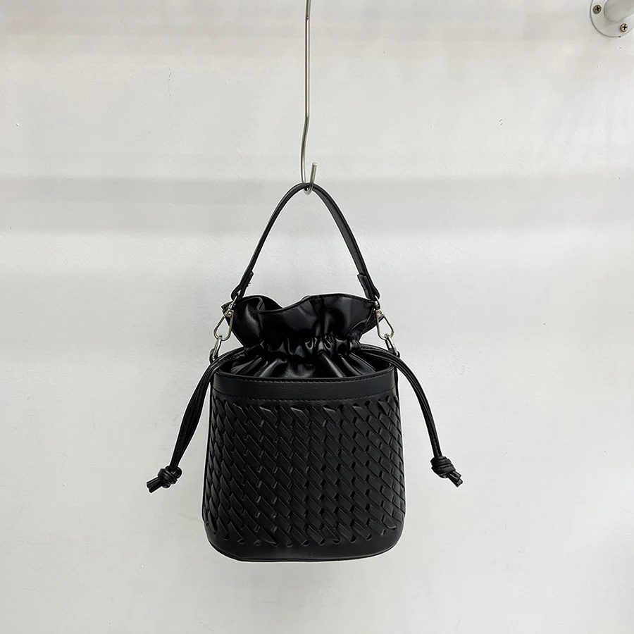 Summer Korea new fashion drawstring bucket bag woven hollow out ladies shoulder crossbody bag female pu leather purse handbags