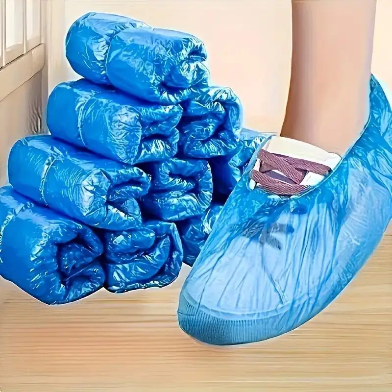 100PCS Hospital-Grade Shoe Covers - Anti-Slip Heavy-Duty PE Protection for Healthcare, Home Cleaning & Travel Hygiene