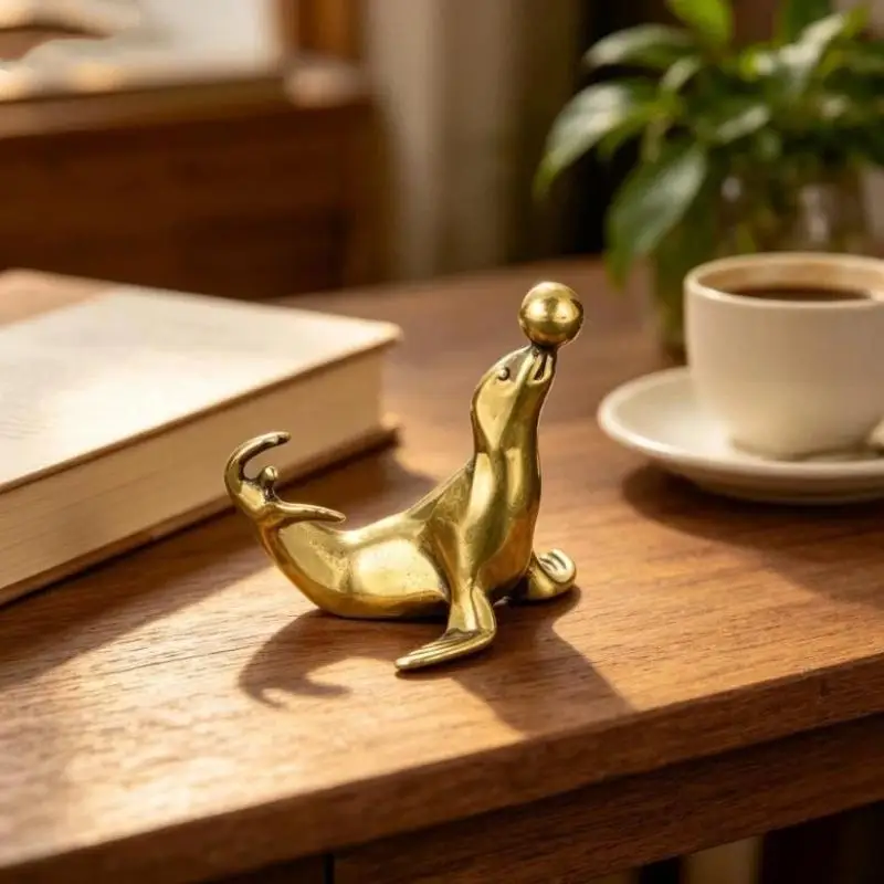Brass Sea Lion Figurine With Vintage Crafted Design And Balancing Ball Detail Perfect For Home Desk Decor Small Gifts Collectio