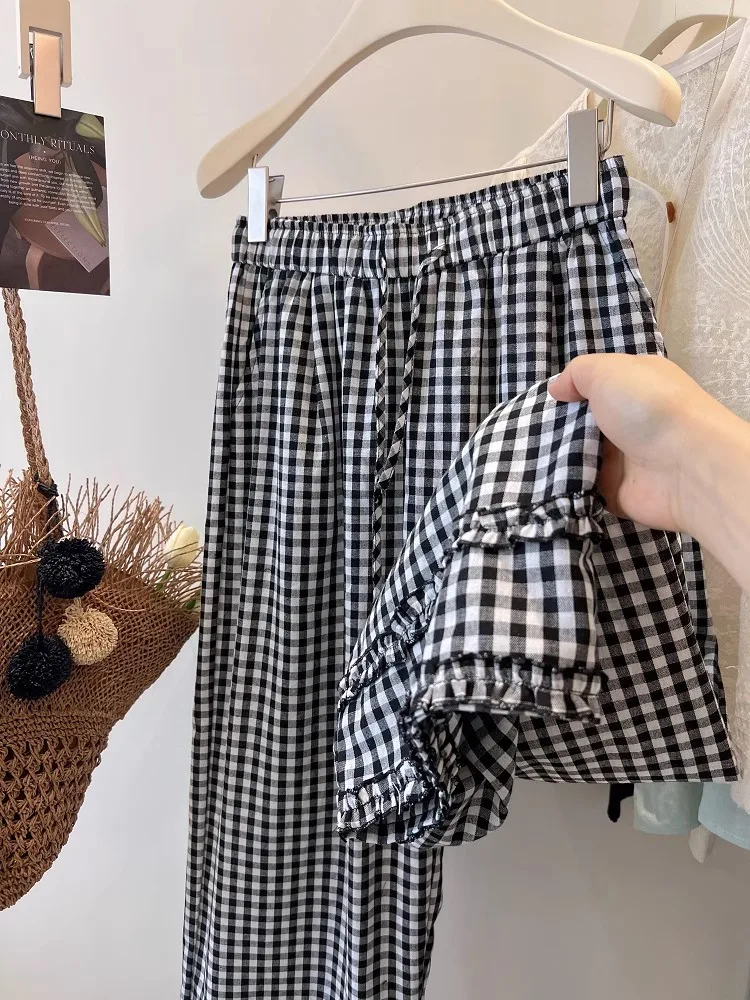 

Американские винтажные брюки в клетку с двойным слоем рюшей, эластичным поясом, свободным кроем, широкими штанинами, из хлопка и льна, повседневные, летние, больших размеров, для женщин.