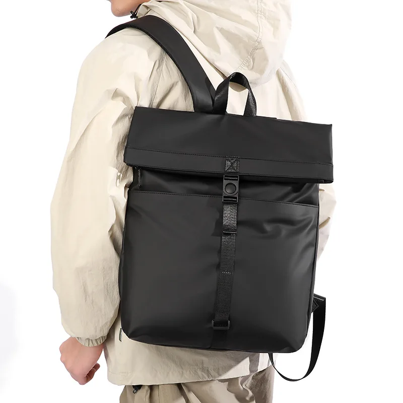 Film-coated waterproof business commuter duffel bag with large capacity flip-top lock and expansion for student schoolbag
