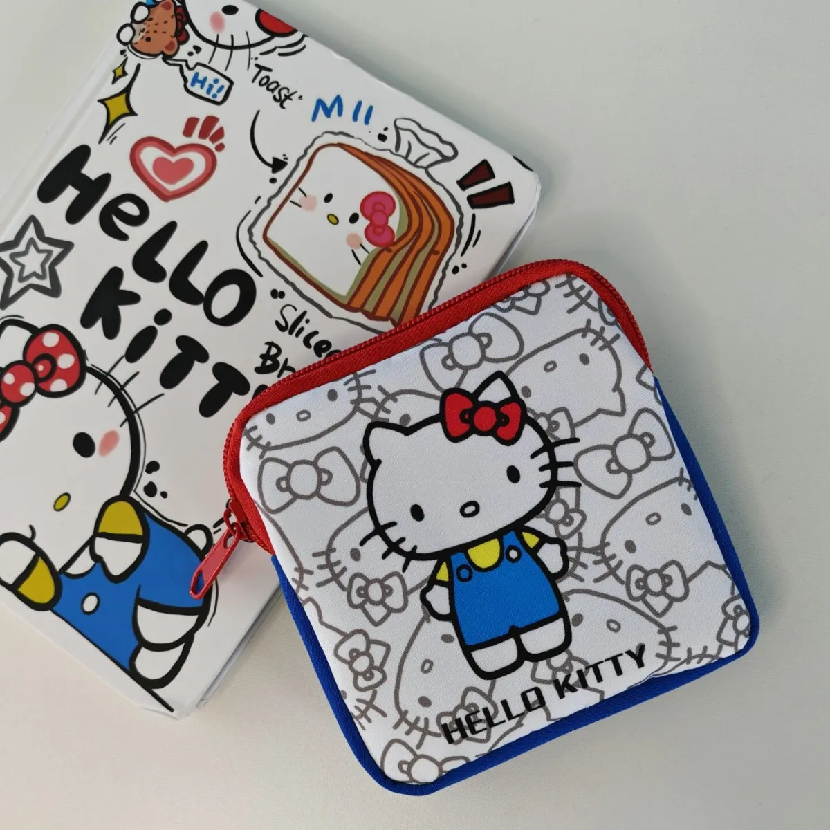 Olá kitty saco de armazenamento portátil dos desenhos animados menina guardanapo sanitário bonito fone de ouvido saco de maquiagem bolsa de moedas titular do cartão saco