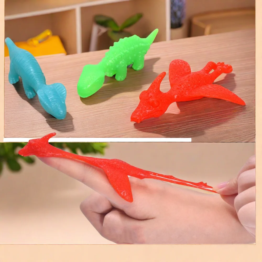 

Wholesale Elastic Launch Dinosaur Finger Toys Elastic Dinosaur Gift for Children Parent Child Stress Relieving Toys