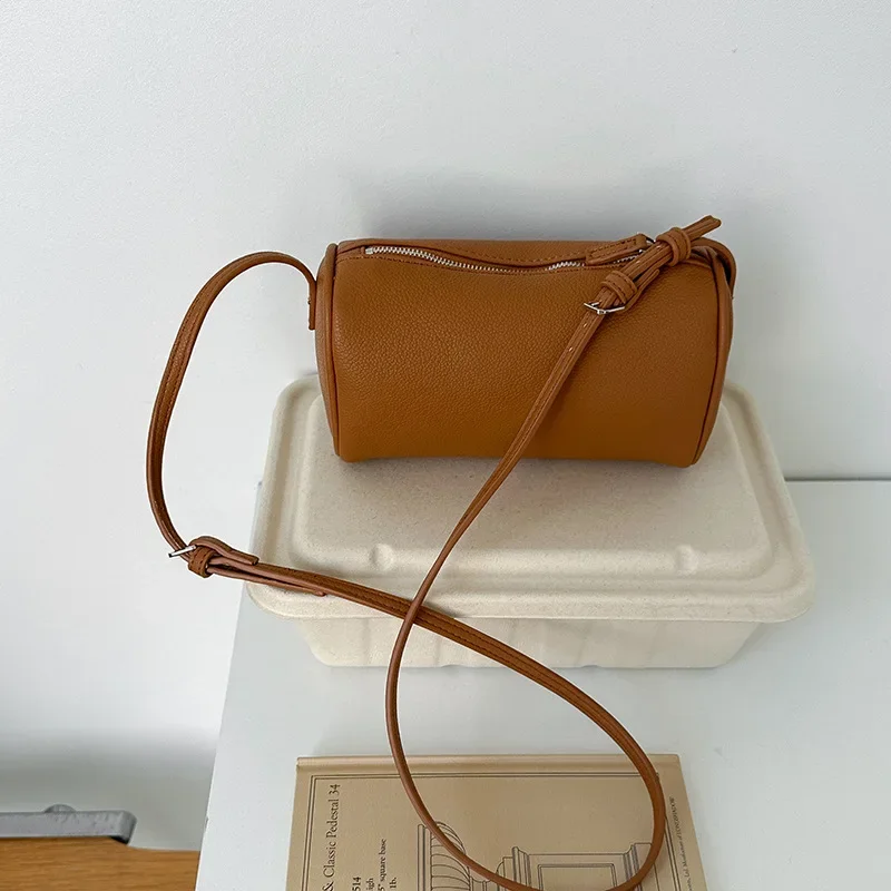 

Korean version niche design mini simple messenger cylinder bag 2025 spring and summer new minimalist lychee pattern handbag