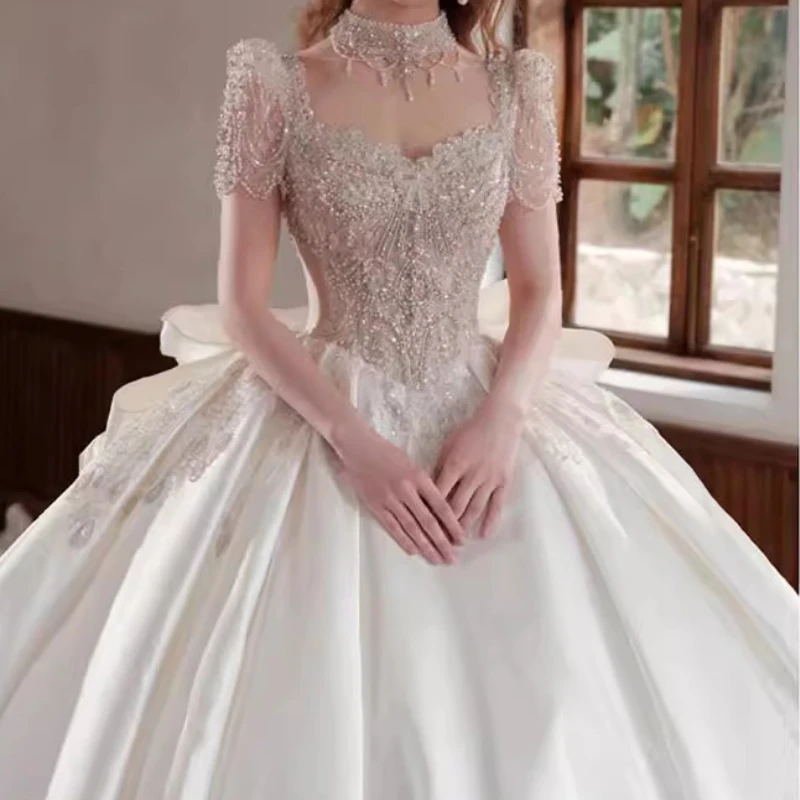 Real Foto Luxe Prinses Vrouwen Trouwjurken Korte Mouw Hoge Hals Kralen Strik Baljurk Bruidsjurk Vestido De Casament