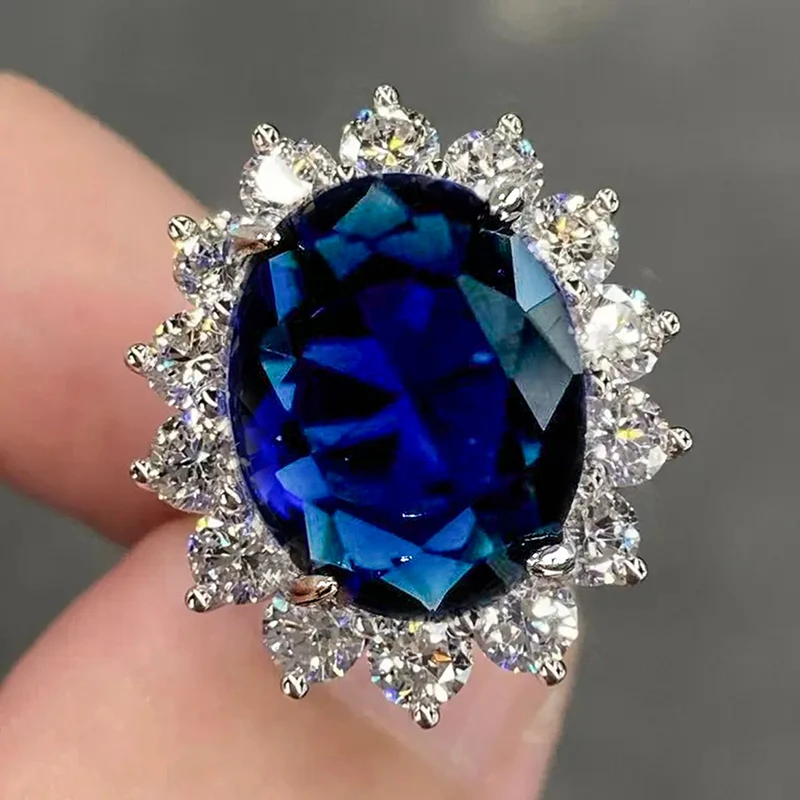 Huitan Große ovale blaue Zirkonia-Ringe für Frauen, funkelnde weibliche Hochzeits- und Verlobungsaccessoires, luxuriöser, trendiger Partyschmuck