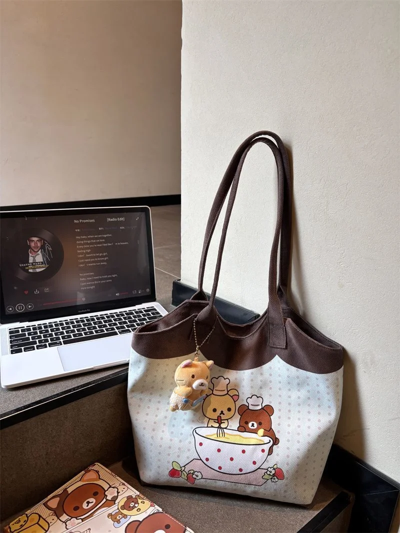 กระเป๋าผ้าแคนวาสสะพายไหล่ลายริลัคคุมะน่ารัก ขนาดใหญ่ จุของได้เยอะ เหมาะสำหรับใช้ในชีวิตประจำวัน นักเรียน นักศึกษา ใช้เดินทาง ของขวัญสไตล์ญี่ปุ่น