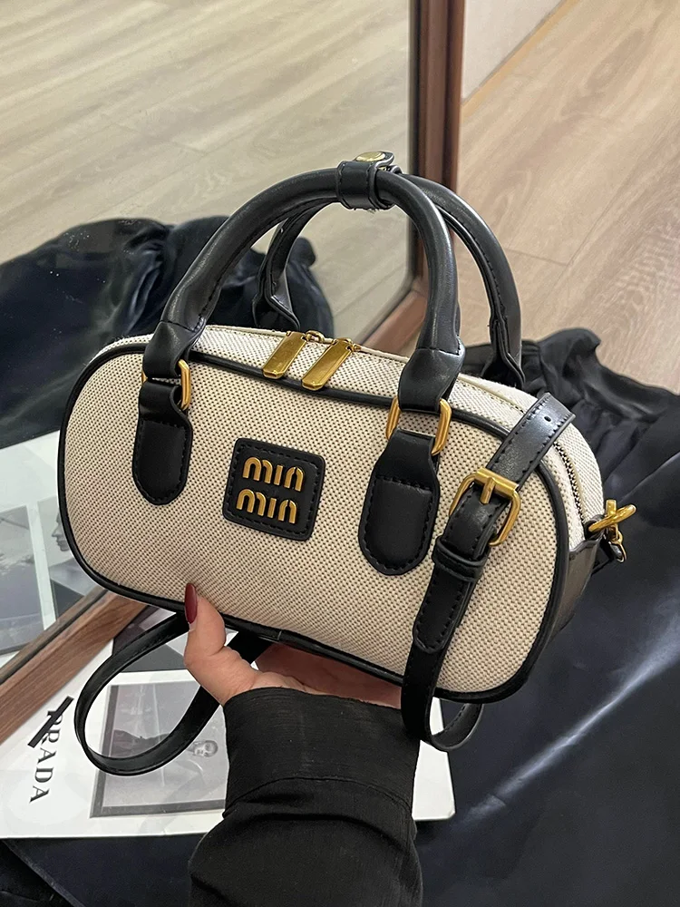 Hand-carrying bowling bag female famous brand 2025 summer new retro fashion shoulder bag high-end trend all-match messenger bag