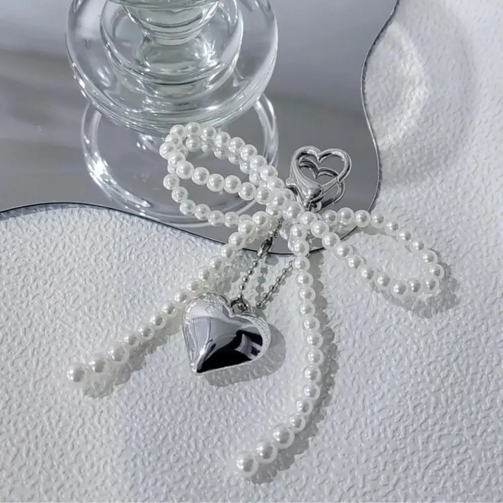 سلسلة مفاتيح من الخرز المضحك ، حلقة مفاتيح على شكل قلب من كلوريد البولي فينيل ، سحر حقيبة الظهر ، ديكور معلق على شكل حقيبة كاواي ، حقائب وهواتف