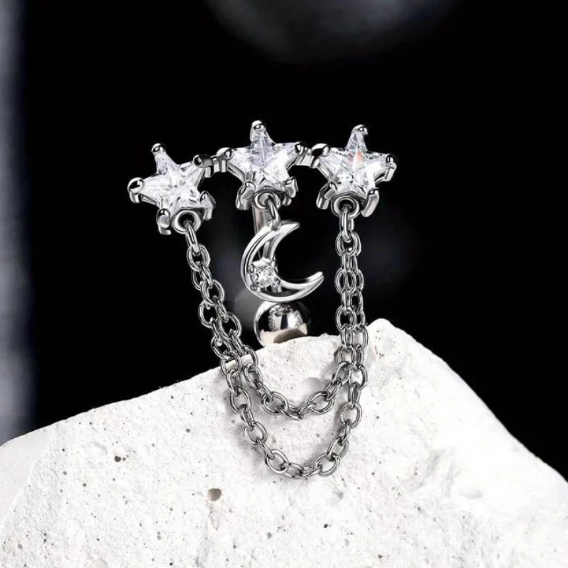 1pc woman with a stainless steel navel featuring stars and the moon design, and a vintage perforated navel nail wearing jewelry