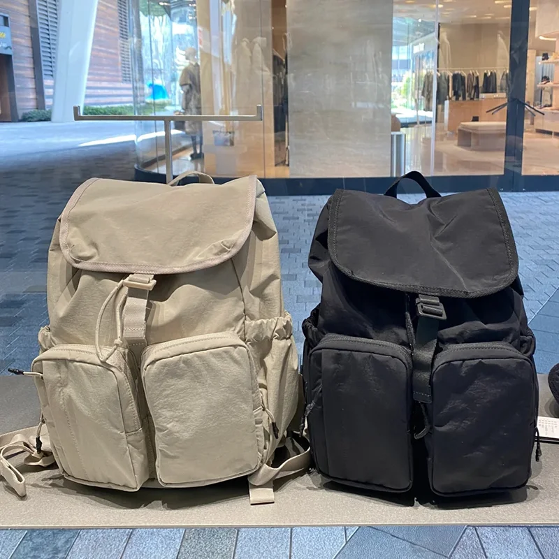 

Korean lightweight backpack for women, simple commuting, new outdoor travel mountaineering schoolbag, computer backpack