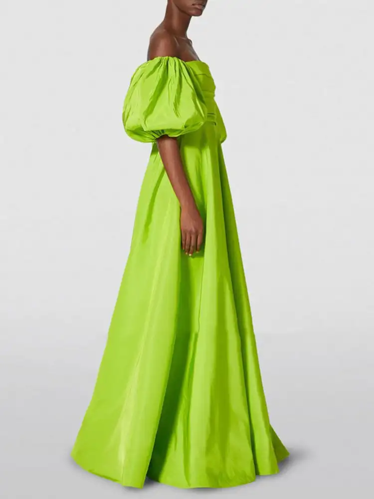 Olis's new presiding catwalk, candy-colored puff sleeve floor-length gown, fashionable and thin