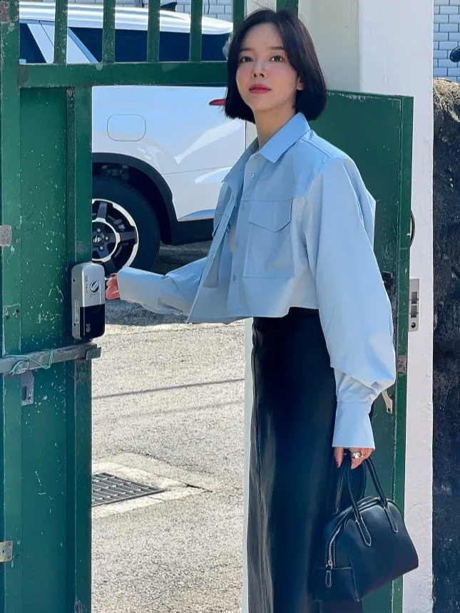 الرجعية عالية الخصر مطاطا بولي Leather الجلود f تنورة للنساء Bla التخسيس منتصف طول شق تنورة Ci تخفيف ألف خط تنورة