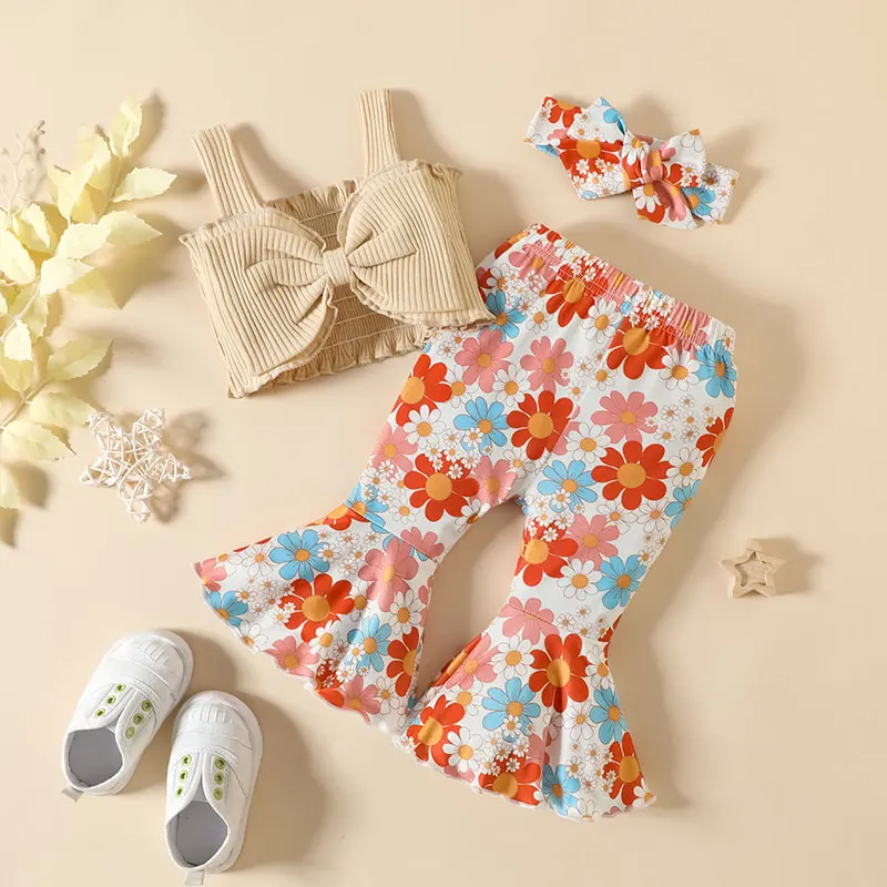 0-24M Girls Solid Color Pit Strip Tie Wrap Suspender Bow Top with Floral Flare Pants Three-piece Suit Suitable for Summer Wear