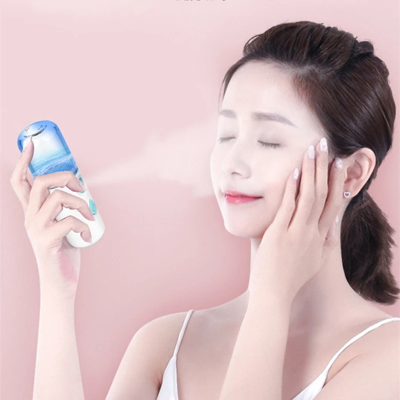 แบบพกพานาโนเติมน้ําความชื้นชาร์จ USB มือถือสเปรย์ความชื้นเหมาะสําหรับการเดินทางในสํานักงาน (สีชมพู)