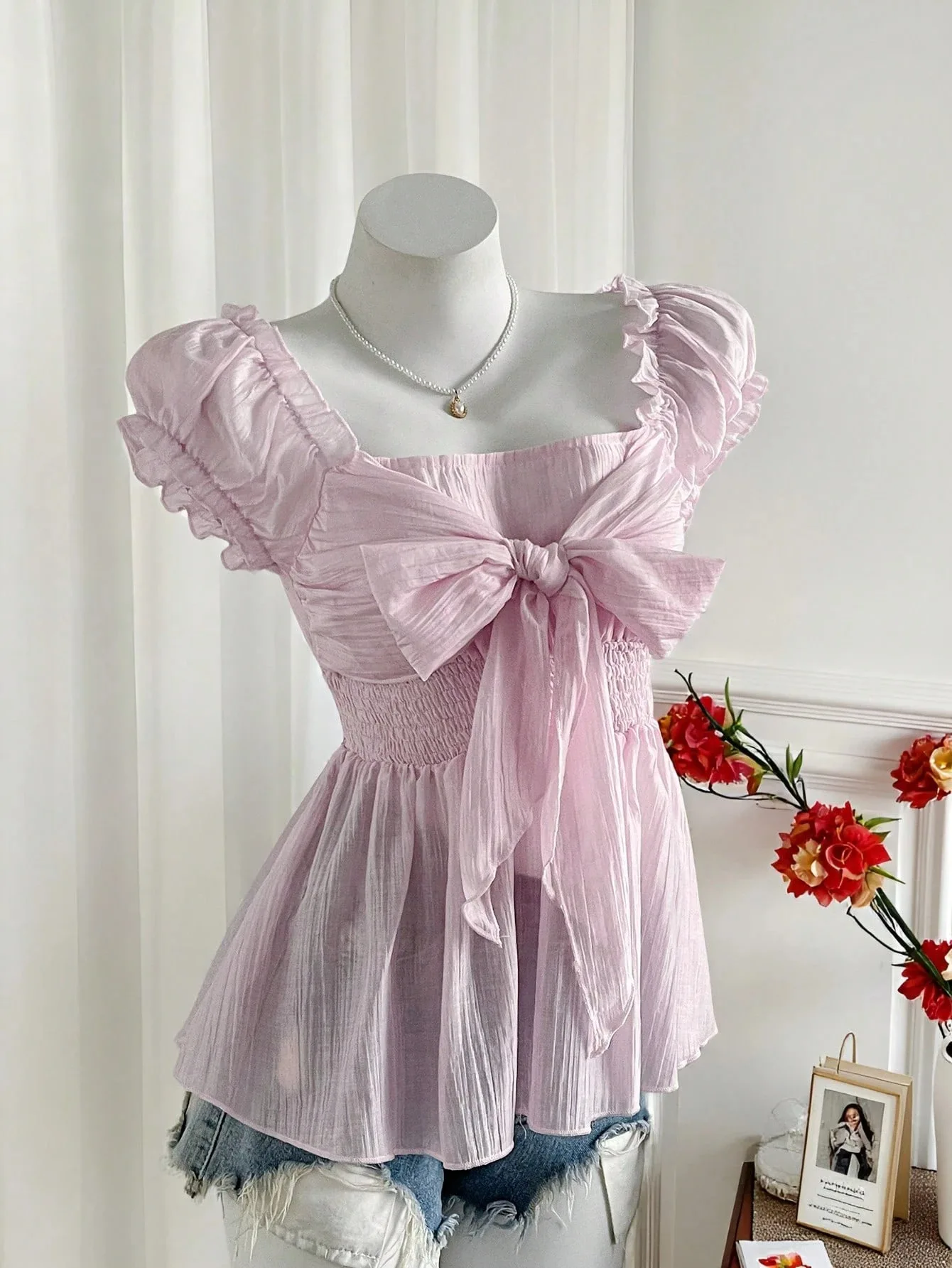 

Light Ruffle Square Neck Front Big Bow Smocked Waist Flutter Cap Sleeve Peplum Blouse Women