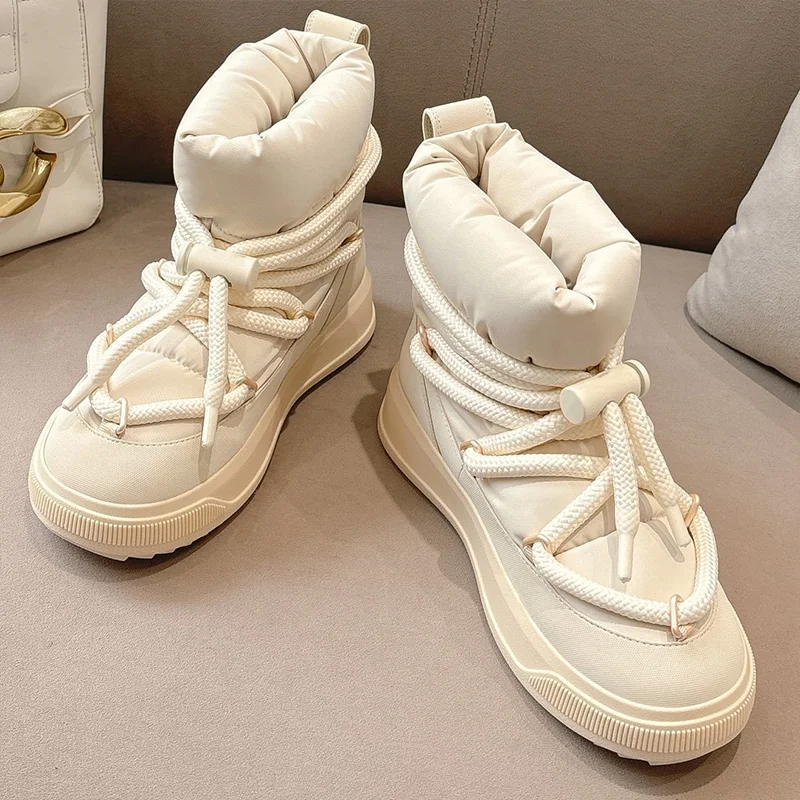 

High quality waterproof down fabric/embossed cowhide woman winter skiing boots with double-sided cashmere rubber outsole25110901