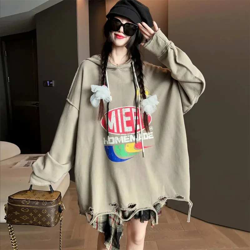 Felpa stampata a maniche lunghe con cappuccio casual allentata alla moda per le donne Top pullover di fascia alta autunno e inverno