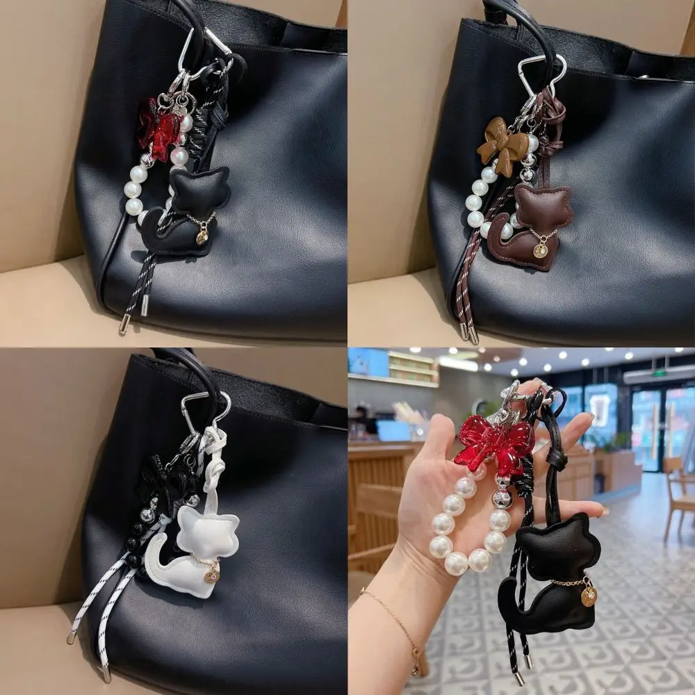لؤلؤة حبة سلسلة الكرتون القط قلادة Bowknot لطيف جديلة حبل المفاتيح الإبداعية بولي Leather حقيبة جلدية معلقة حقيبة الإكسسوارات الديكور