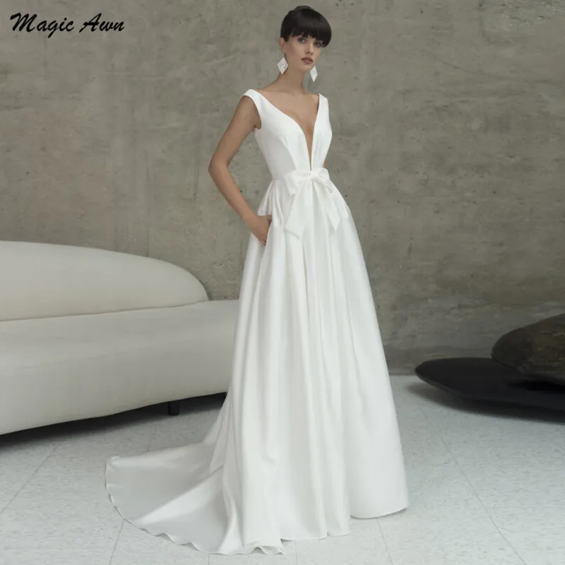 Magic Awn Elegant White Wedding Dresses 2022 Satin Bow Backless A-Line Simple Mariage Gowns With Pockets Vestidos De Novia