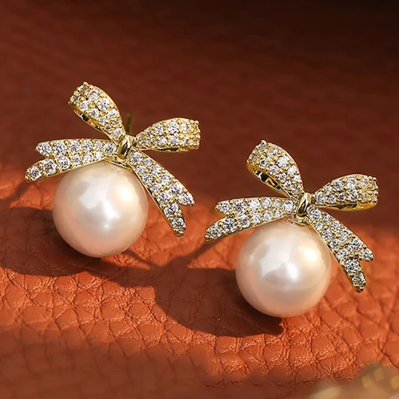 Huitan สีทอง Bowknot STUD ต่างหู Lady Wedding PARTY Graceful อุปกรณ์เสริมจําลอง Pearl Brilliant Zirconia เครื่องประดับ