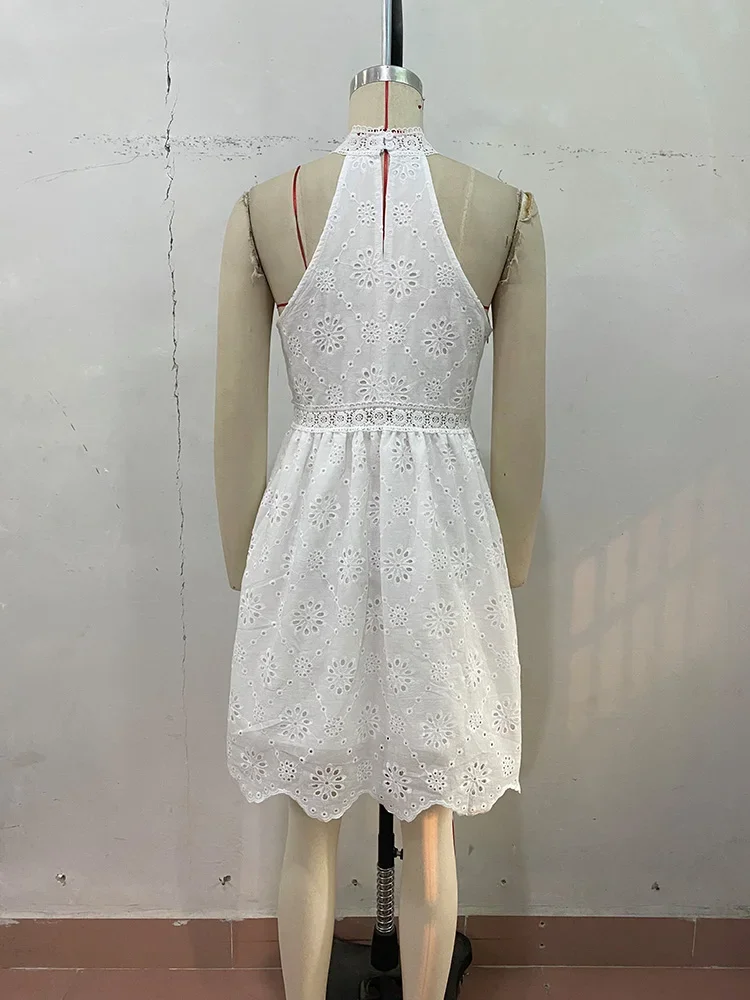 Abito bianco senza maniche scavato con scollo all'americana Estate nuove donne Boho Fashion Holiday Mini abiti a trapezio femminili