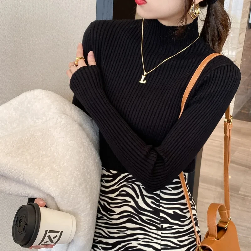 ฤดูใบไม้ร่วงและฤดูหนาวกึ่งสูงคอถักเสื้อกันหนาวสีทึบเสื้อแขนยาวกระชับสัดส่วน TOP 118