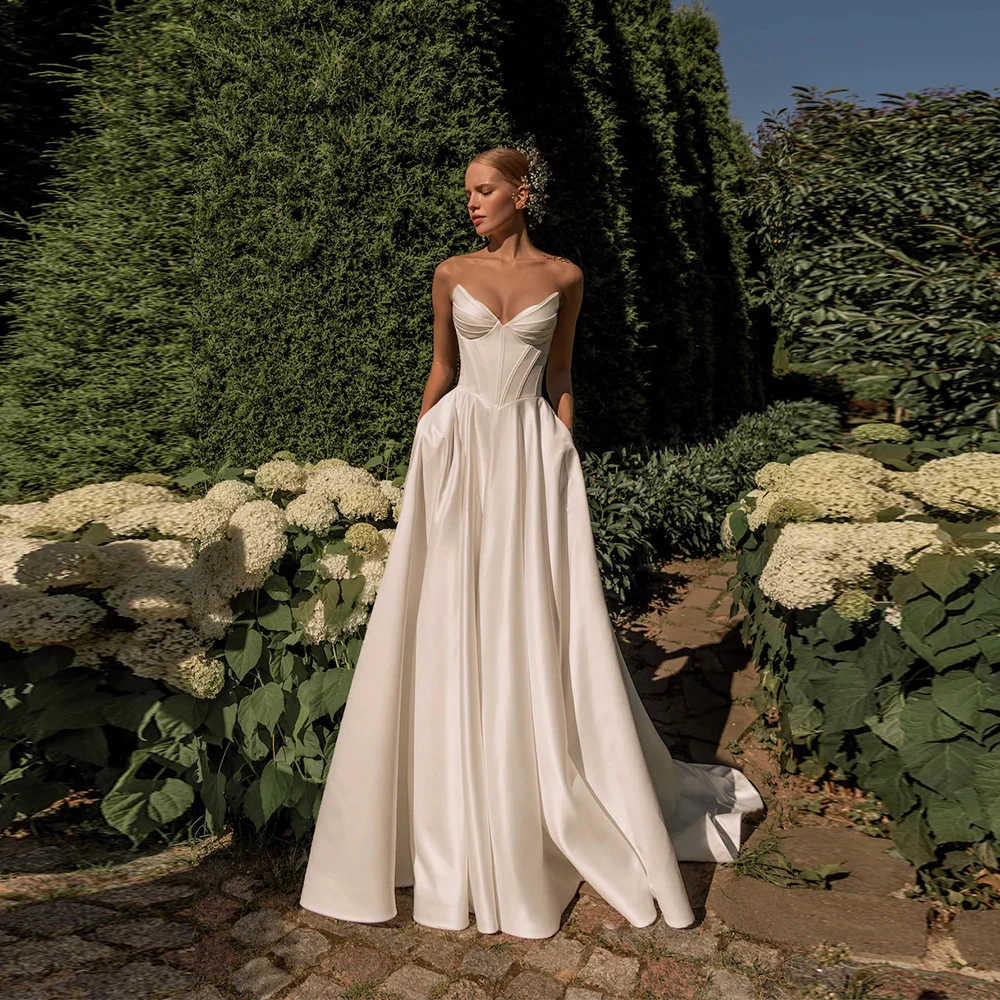 

Элегантные атласные свадебные платья по индивидуальному заказу, трапециевидное платье без бретелек на шнуровке с v-образным вырезом, плиссированное шикарное платье для выпускного вечера невесты, простые свадебные платья 2025