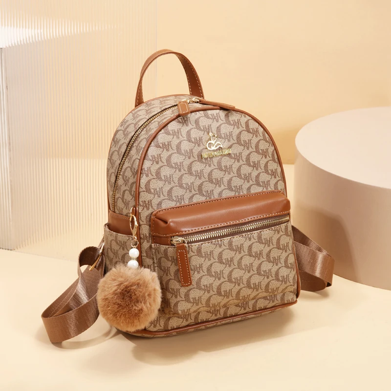 Senior fashion simple retro letter-printed women\'s backpack, small texture all-in-one backpack, exquisite small pompon pendant