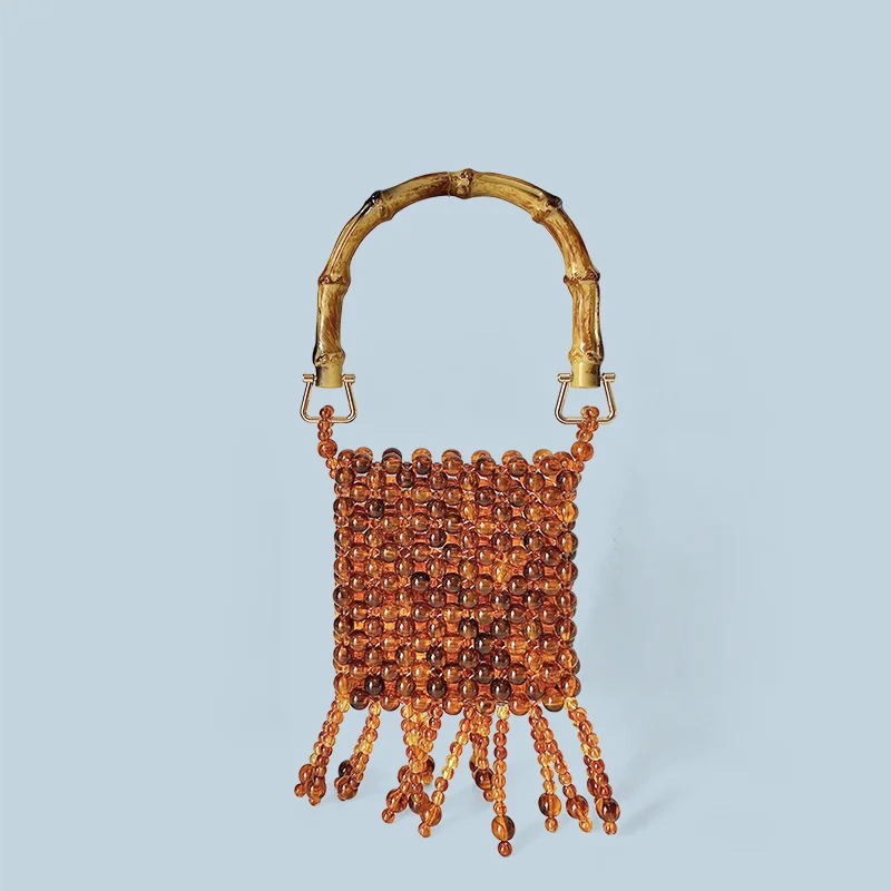 24 year autumn new imitation bamboo handmade woven bead pearl tassel banquet amber handbag