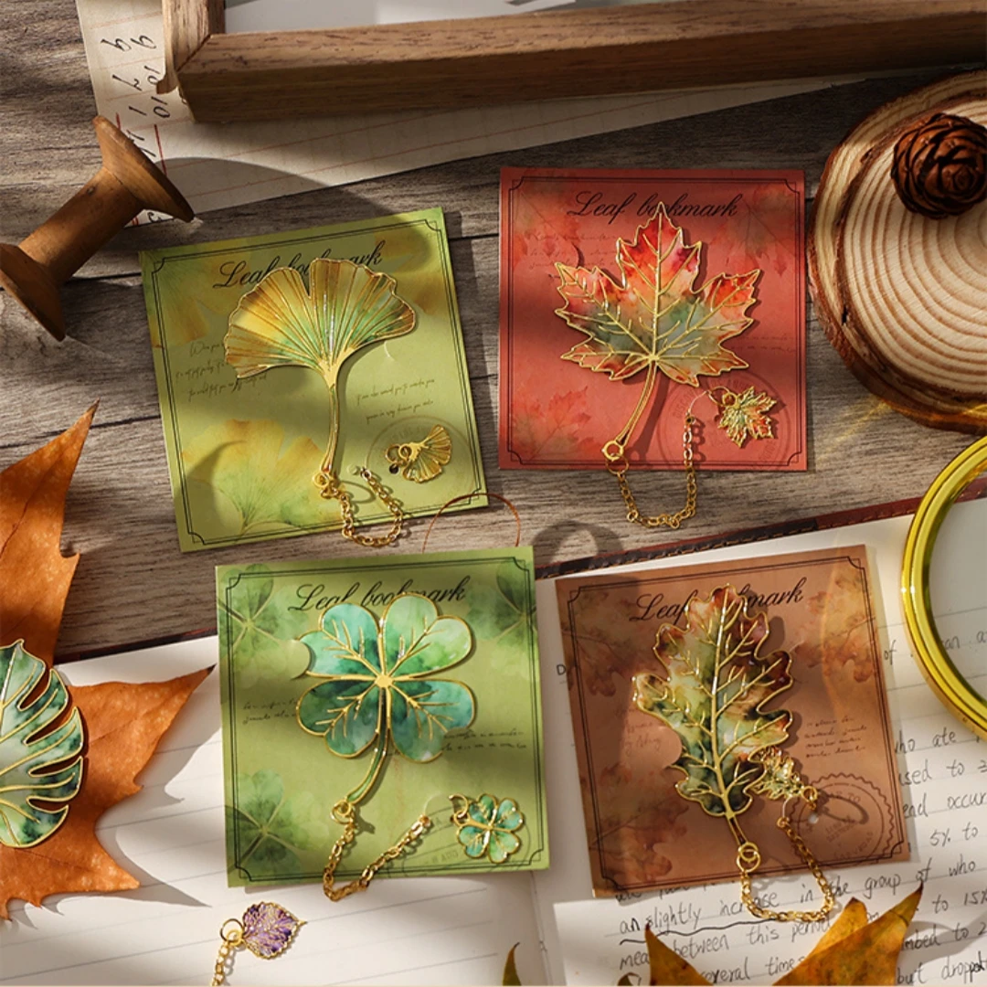 Exquisito marcapáginas de hoja de Metal con colgante de cadena de Metal, hoja de arce, hoja de Ginkgo, trébol de cuatro hojas, marcapáginas de lectura para amantes de los libros