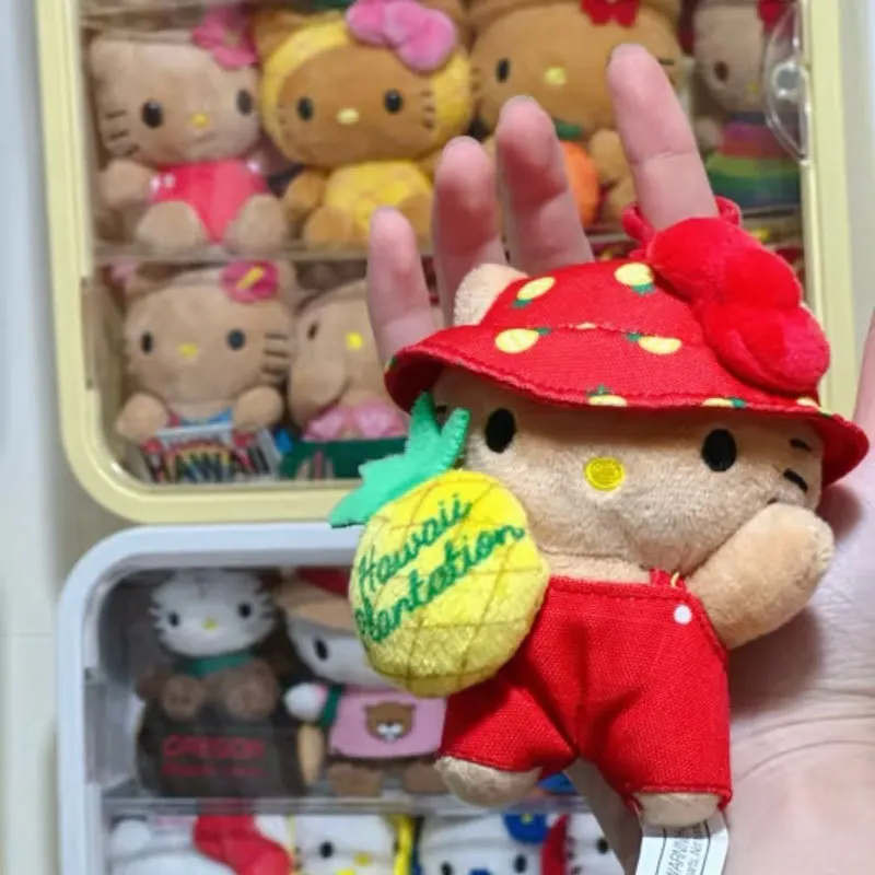 Para Kawaii HelloKitty 50 aniversario hawaiano piel negra piña serie anillo de natación muñeco de peluche mochila decoración colgante