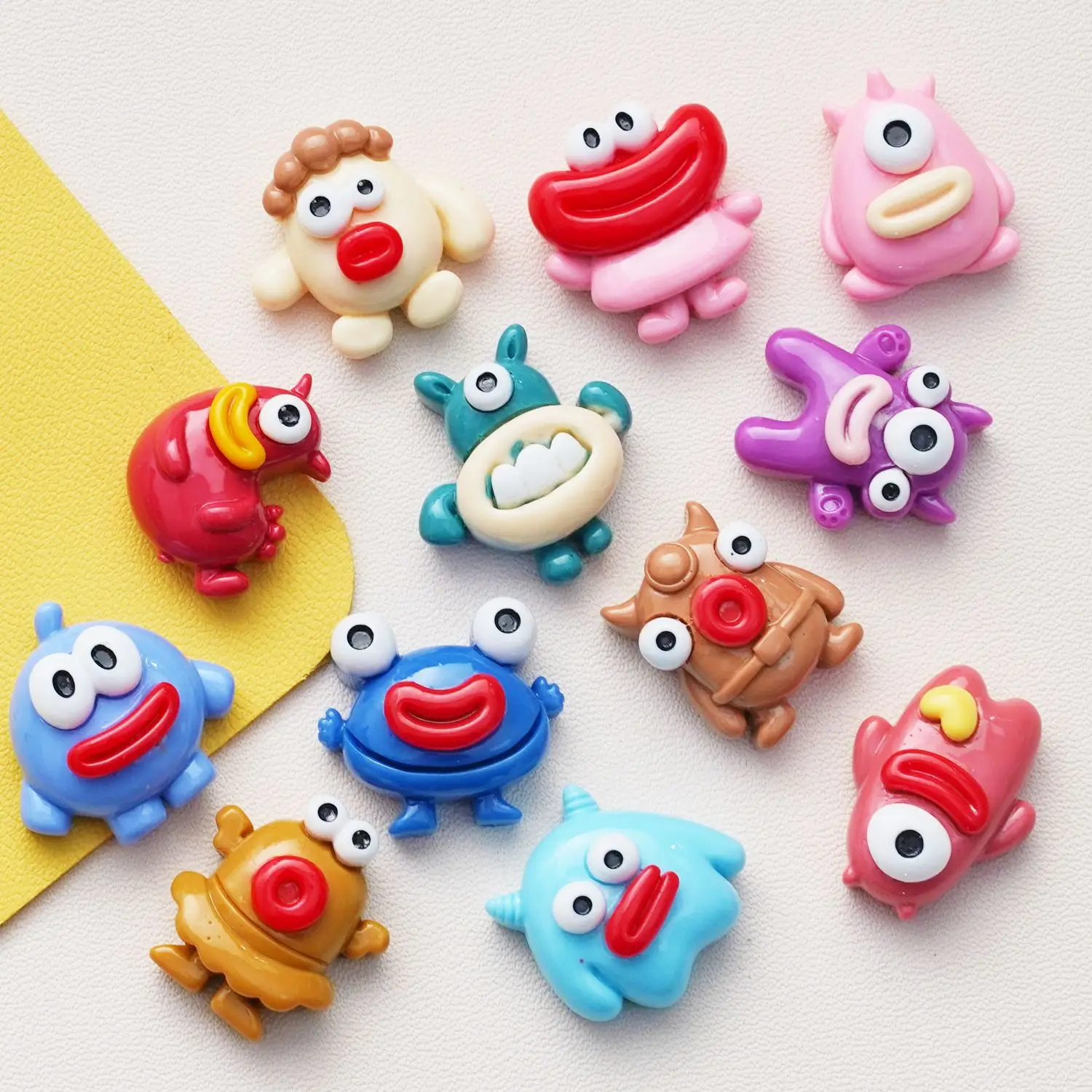 

12PCS Twelve small monsters new cartoon cream glue resin accessories hairpin DIY accessories pendant jewellery accessories