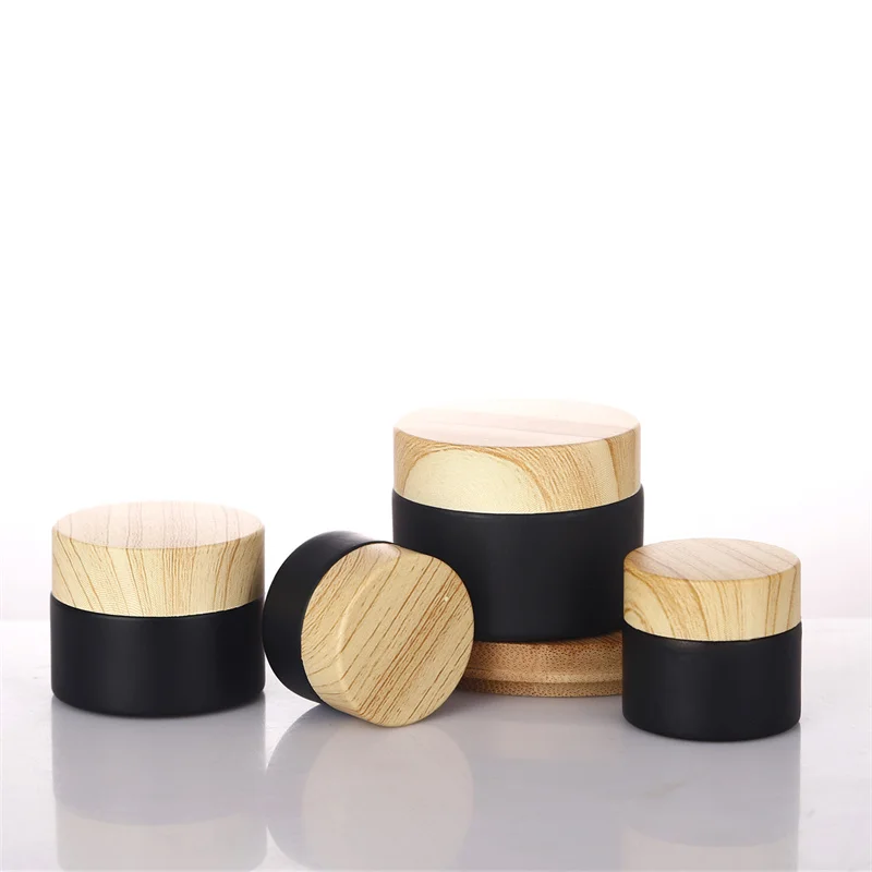 200pcs 1oz 2 oz 4 oz Cosmetic Black Frosted Glass Eye Cream Container Skincare Face Cream Jar with Bamboo Lid