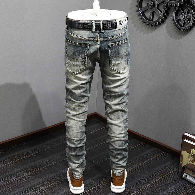 

JXN812 retro new broken hole jeans men's Slim small feet youth Korean version of the elastic trend of spring and summer trousers